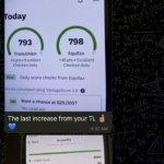 Mobile phone screen displaying improved credit scores from Credit Karma and a celebratory message